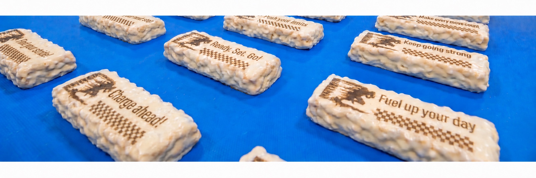 Industrial food decoration solutions operating inline in a commercial production facility